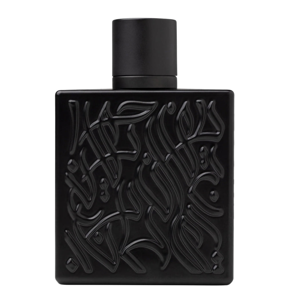 Black perfume bottle with intricate design on a white background