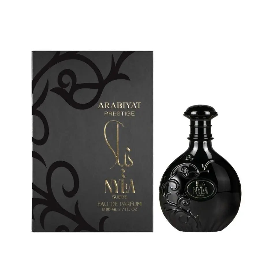 Nyla Suede by Arabiyat Prestige 80ml EDP unisex fragrance with black ornate bottle and matching luxury box, ideal for lovers of gourmand leather scents.