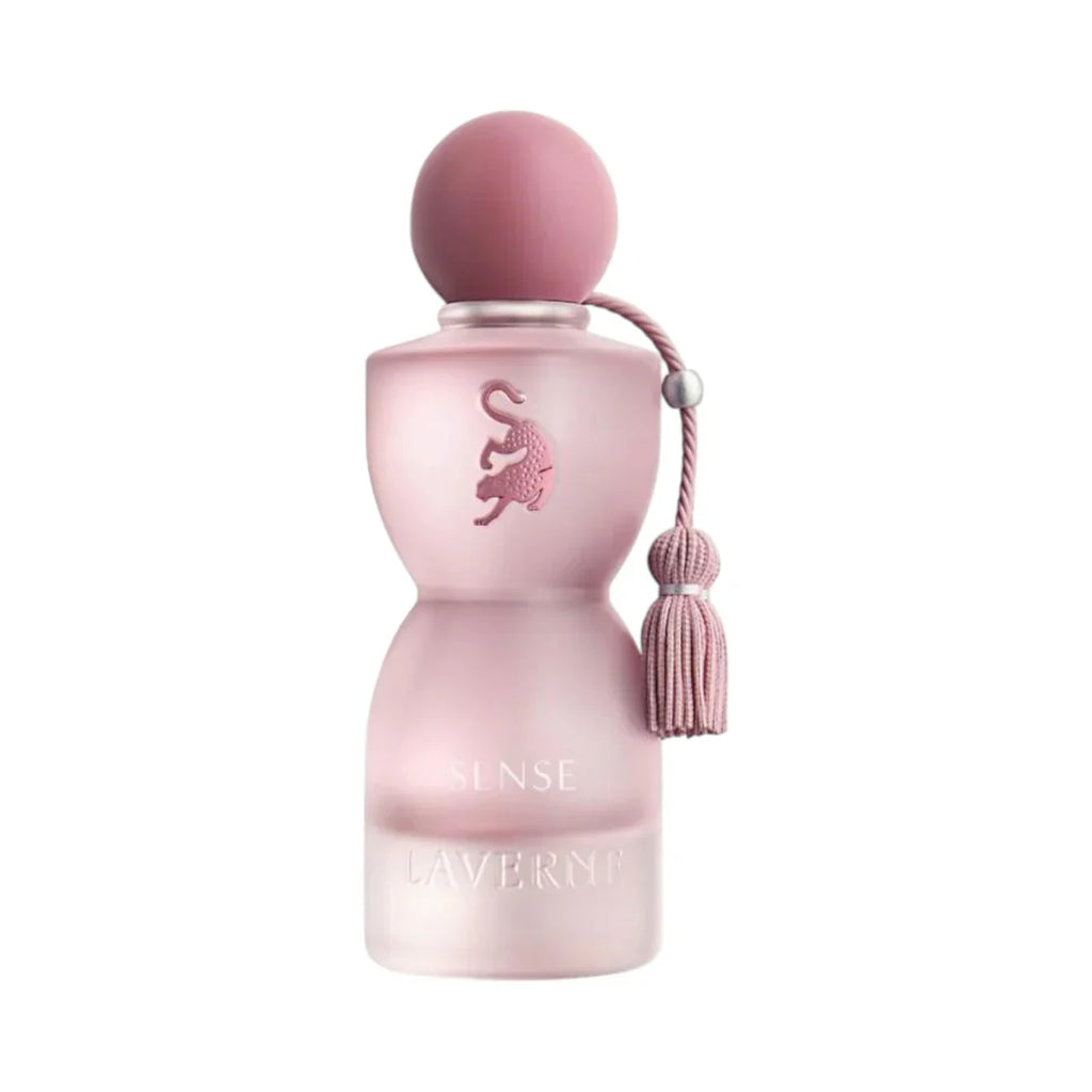 Pink perfume bottle with a tassel on a white background