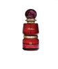 Red perfume bottle with gold accents on a white background