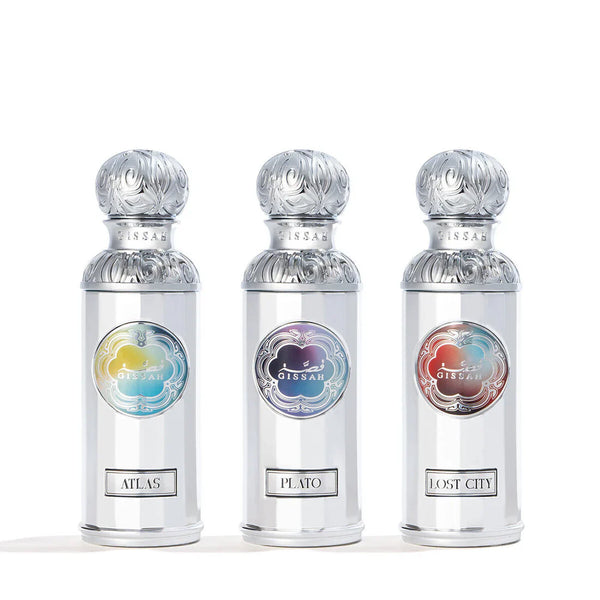 Gissah Atlantis set 3x50ml EDP featuring Atlas, Plato, and Lost City perfumes in elegant silver bottles with colorful labels.