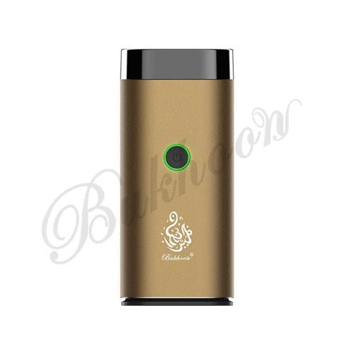 Gold Portable Electric Rechargeable Bakhoor Burner with green power button, perfect for stylish home fragrance enhancement.