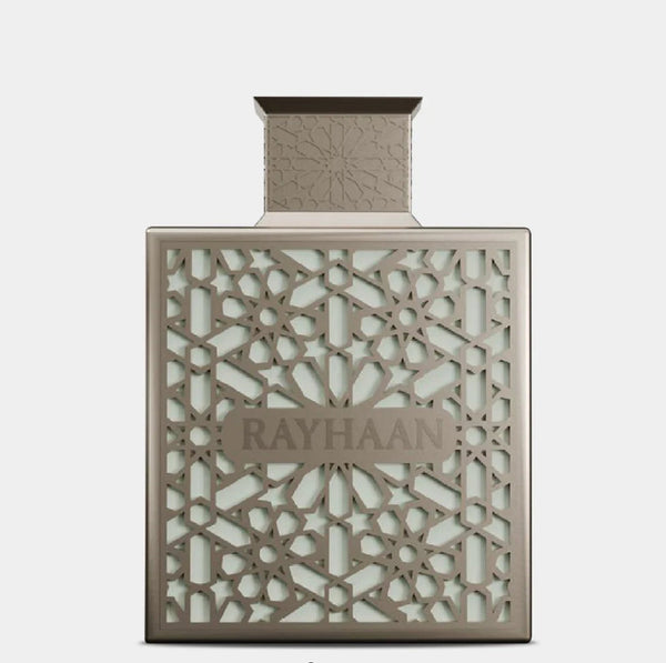 Perfume bottle with intricate design and 'RAYHAAN' branding on a light gray background