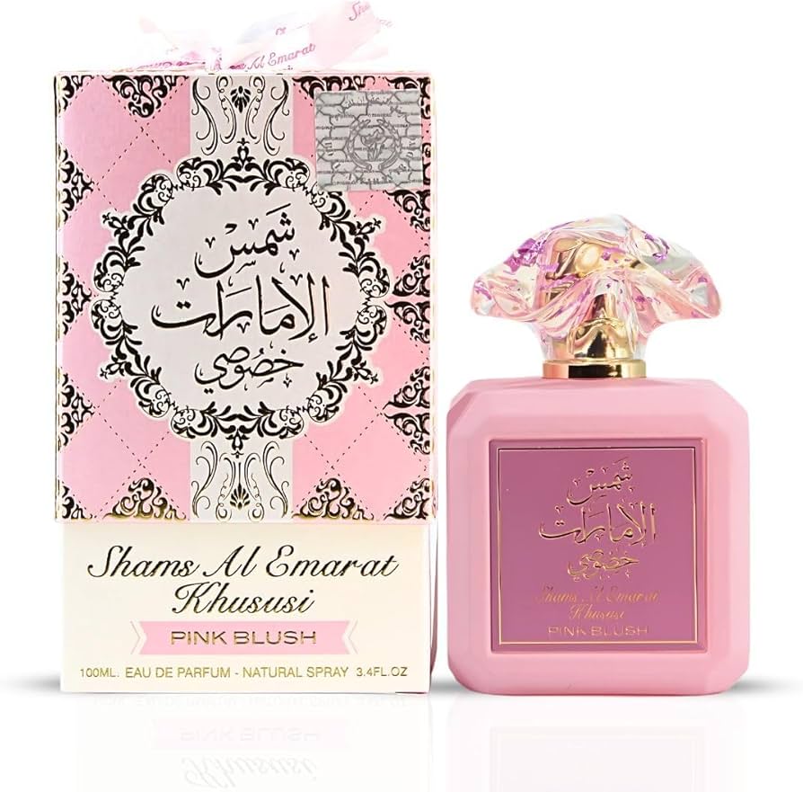Shams Al Emarat Khususi Pink Blush perfume bottle and packaging on a white background