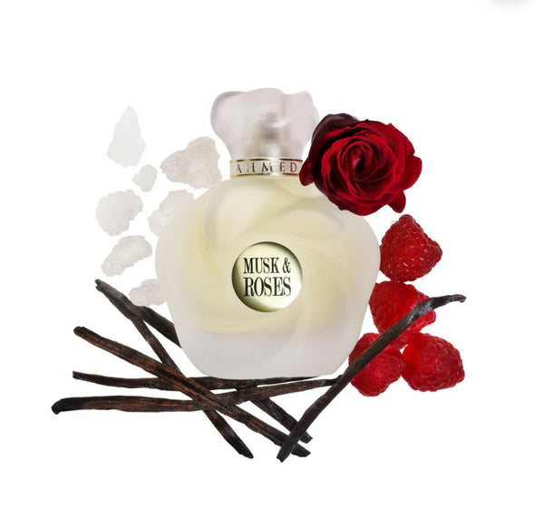 Perfume bottle labeled 'Musk & Roses' with red roses and vanilla beans on a white background