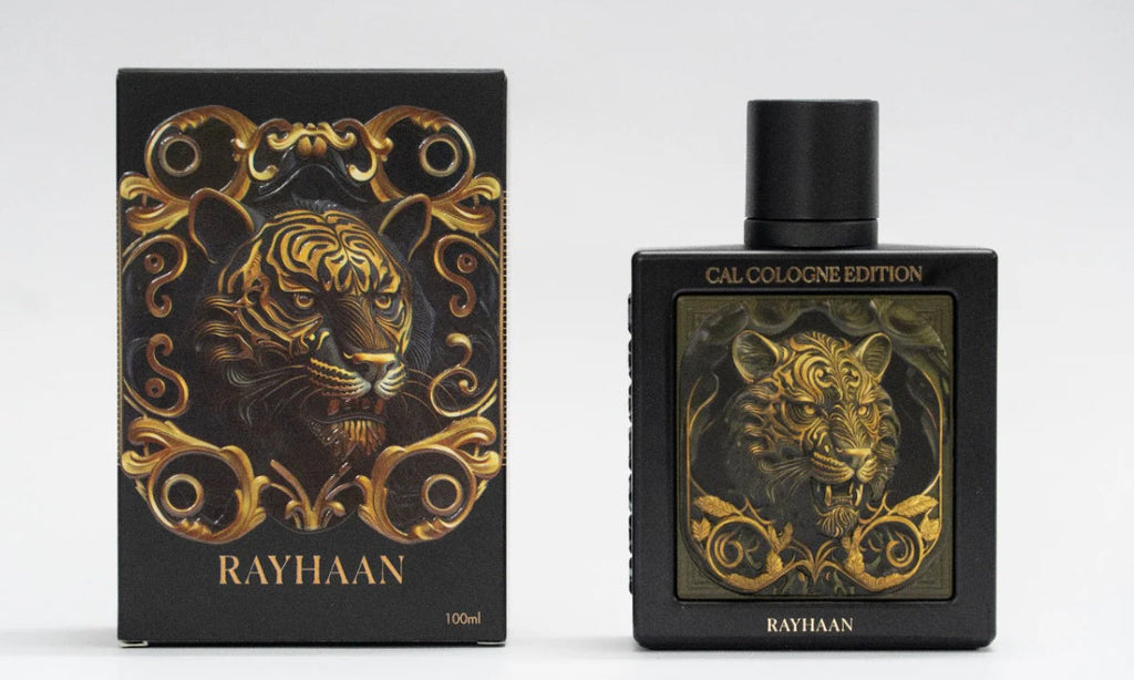 Perfume bottle and packaging with tiger design and 'RAYHAAN' branding on a white background