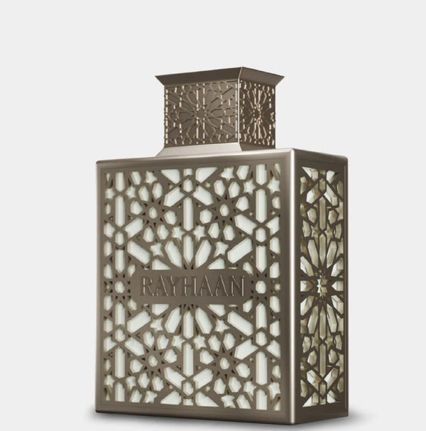 Decorative lantern with intricate cut-out design on a light gray background