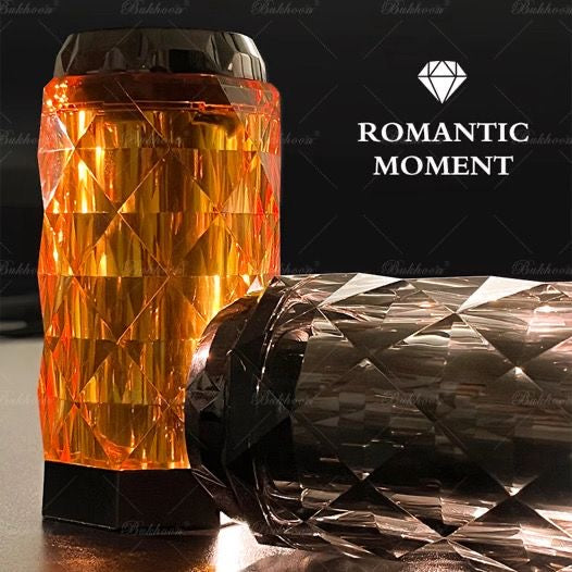 Amber and black Modern Geometric Design Electric Bakhoor Burners with crystal-like texture, creating a romantic home fragrance ambiance.