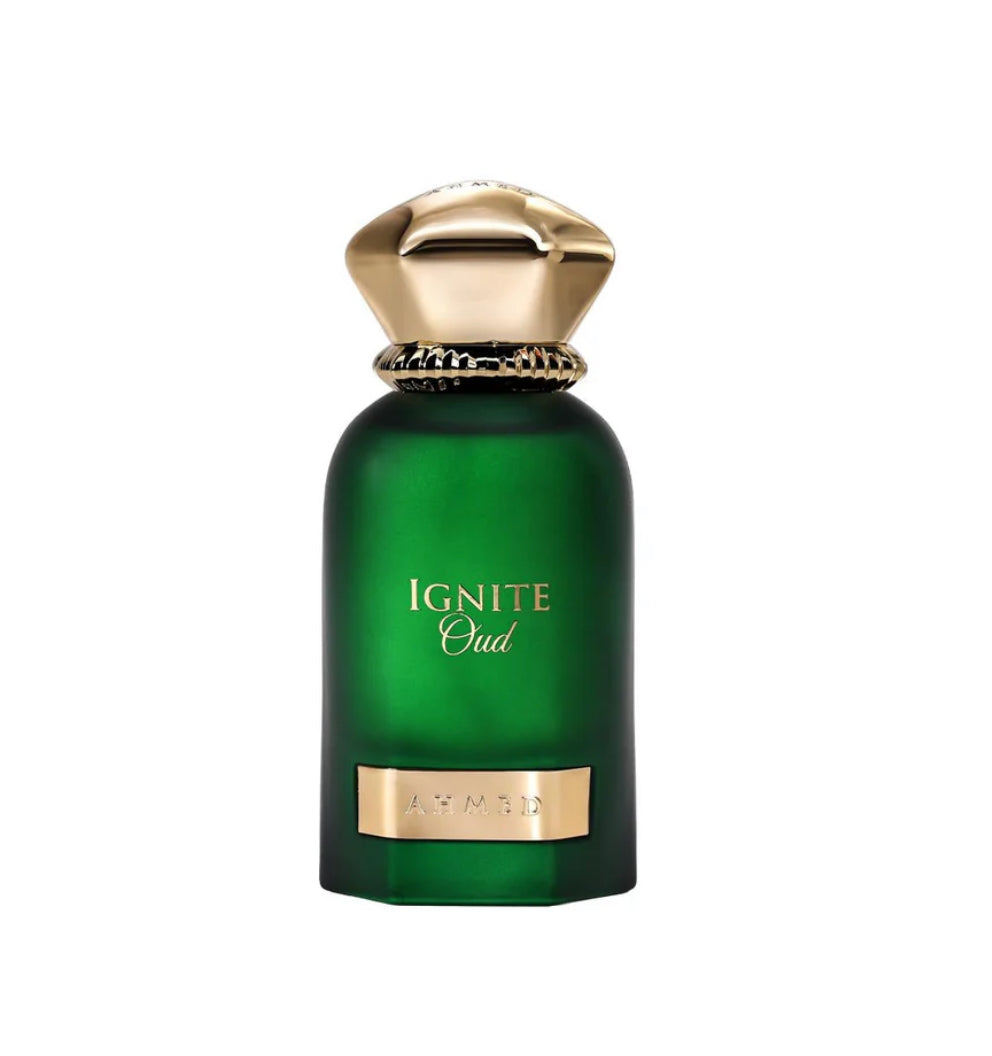 Green perfume bottle with gold cap and 'Ignite Oud' text on a white background