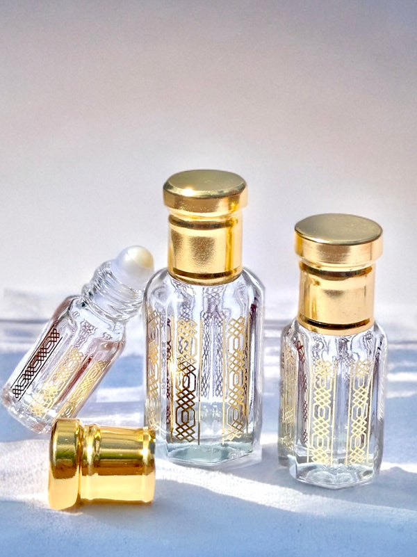 Luxury perfume oil bottles with gold caps for women