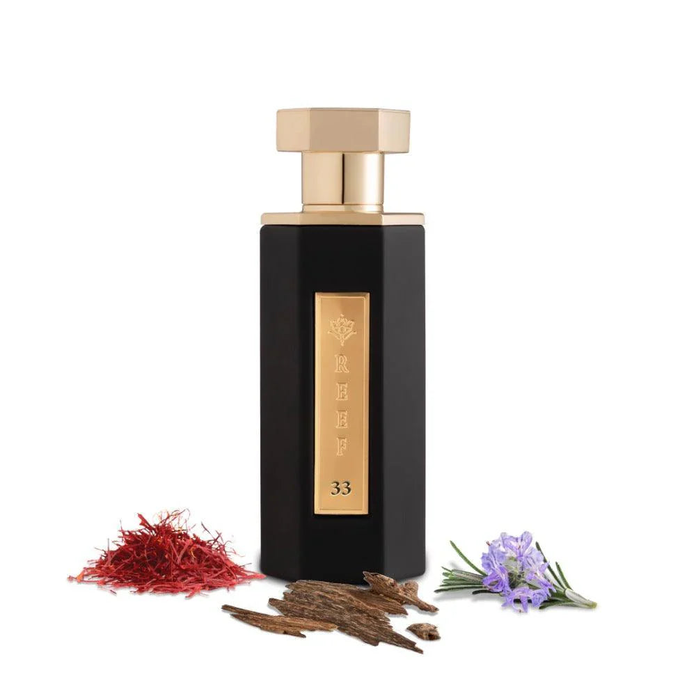 Reef 11 By Reef Perfumes EDP 100ml in a sleek black and gold bottle, surrounded by saffron, oud wood, and floral notes, ideal for unisex use.
