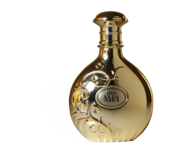 Gold bottle of Nyla Vani-Elle by Arabiyat Prestige 80ml EDP featuring embossed floral detailing, ideal for lovers of sweet vanilla perfumes.