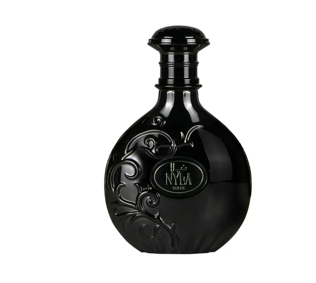 Black perfume bottle with intricate designs on a white background