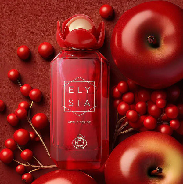 ELYSIA Apple Rouge by Fragrance World 100ml EDP perfume bottle in vibrant red, surrounded by apples and berries, ideal for bold, fruity summer scents.