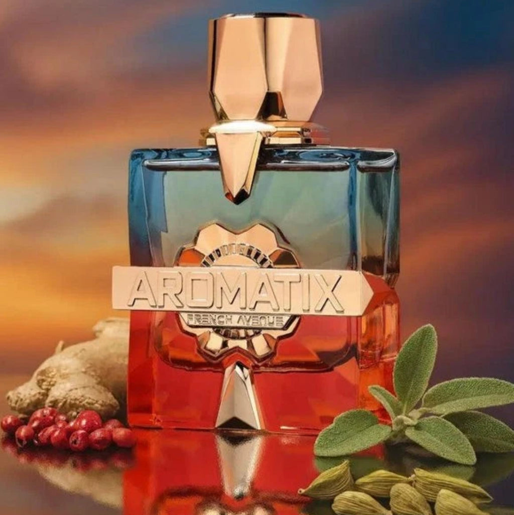 Perfume bottle with gold cap and label on a reflective surface with natural elements and sunset background