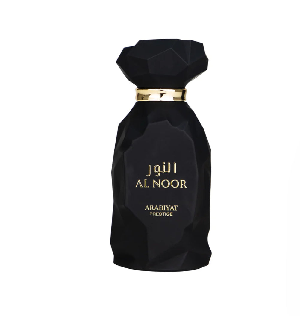 Black perfume bottle labeled 'Al Noor' by Arabiyat on a white background