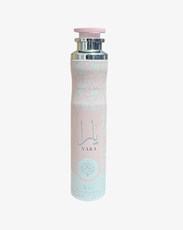 Lattafa Yara Air Freshener 320ml in a pastel pink and silver spray can, ideal for home fragrance and elegant decor enhancement.
