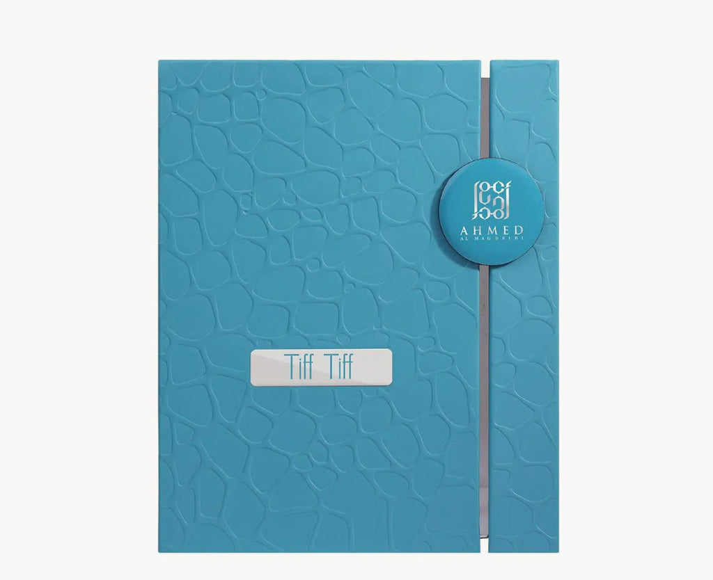 Blue textured notebook with 'Tiff Tiff' branding on a white background