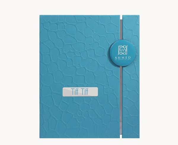 Blue textured notebook with 'Tiff Tiff' branding on a white background