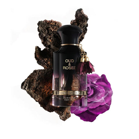 Perfume bottle labeled 'Oud & Rosee' with purple flower and dark rock background