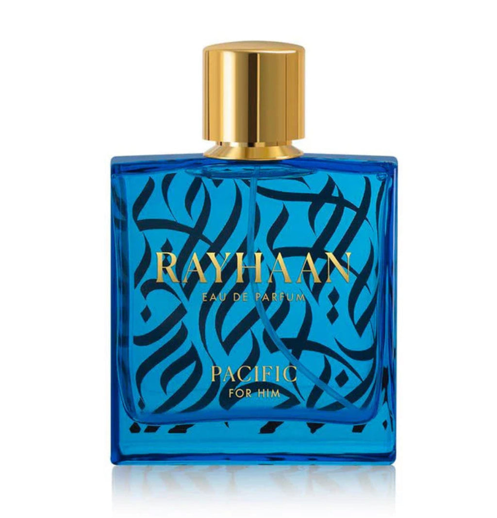 Blue perfume bottle with gold cap labeled 'Rayhaan' on a white background