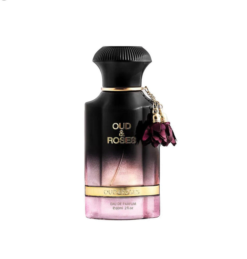 Perfume bottle labeled 'Oud & Roses' on a white background