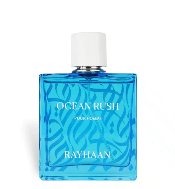 Blue perfume bottle labeled 'Ocean Rush' by Rayhaan on a white background