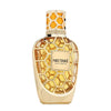 Gold honeycomb-patterned perfume bottle with 'Nectare' branding on a white background