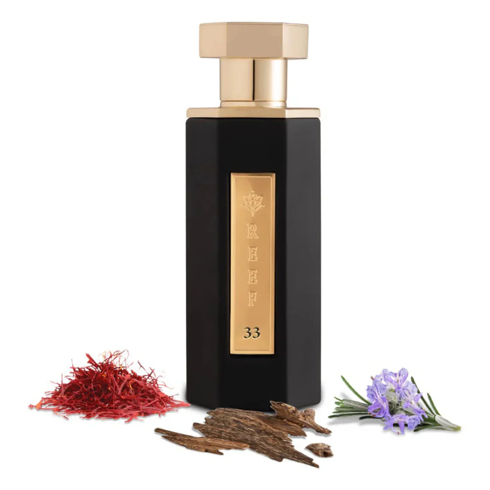 Reef 31 By Reef Perfumes EDP 100ml bottle with saffron, oud wood, and lavender notes, highlighting its strong and warm scent profile.