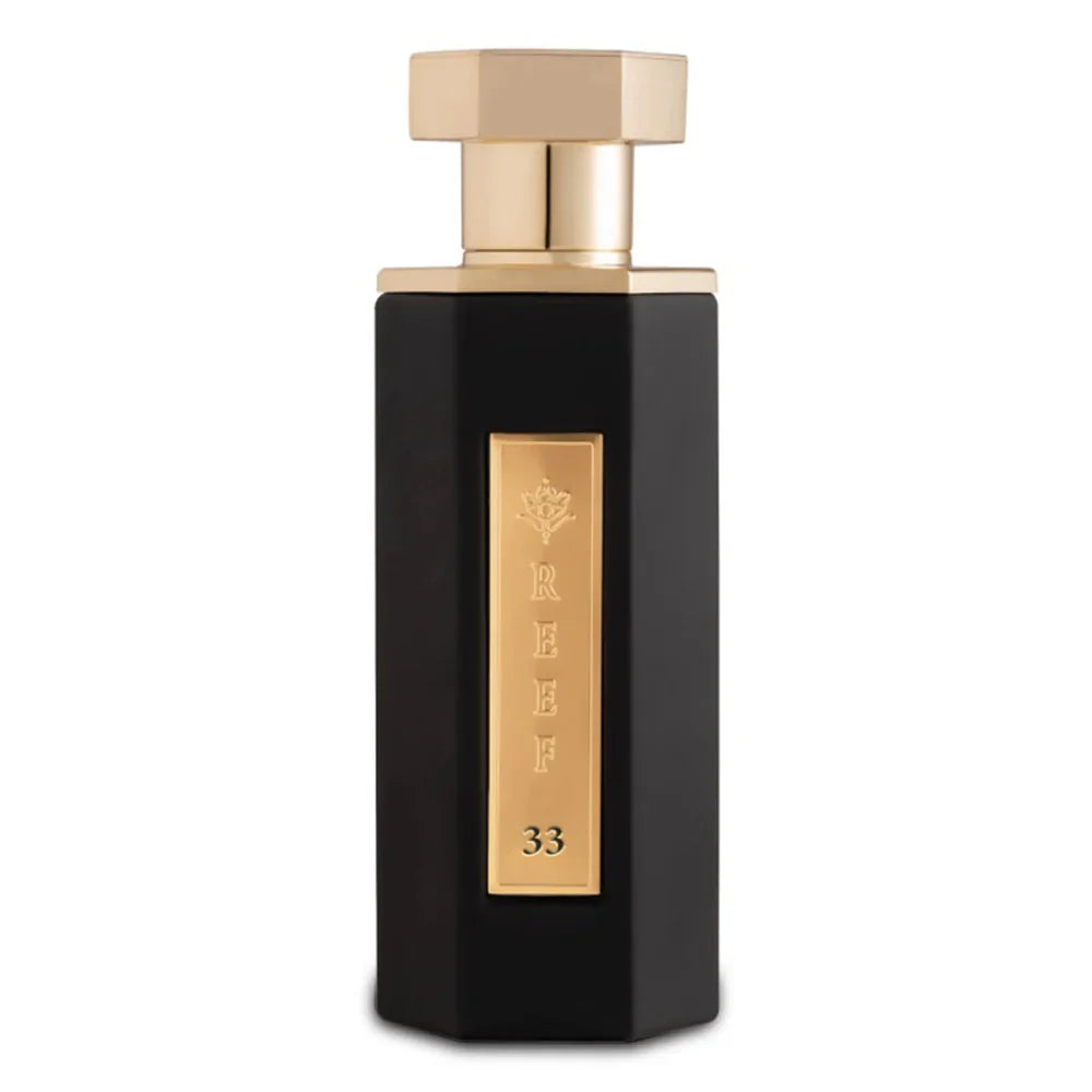 Reef 33 By Reef Perfumes EDP 100ml in a sleek black and gold hexagonal bottle, ideal for bold and woody men's fragrance lovers.