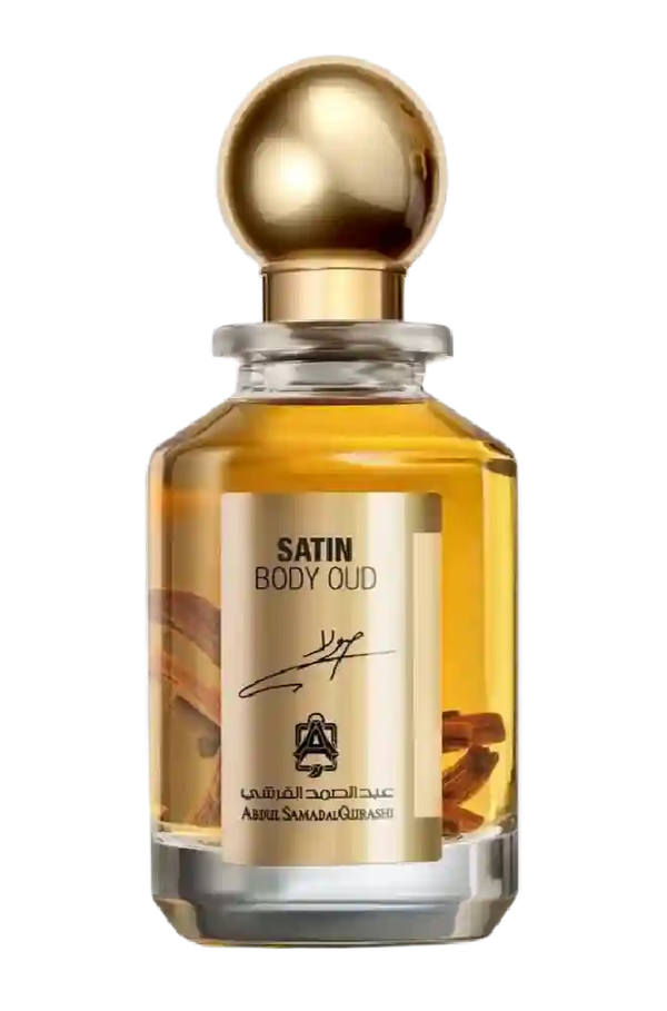 AbdulSamad AlQuraishi Satin Body Oud perfume in a clear glass bottle with gold cap, showcasing luxurious woody and spicy fragrance notes.